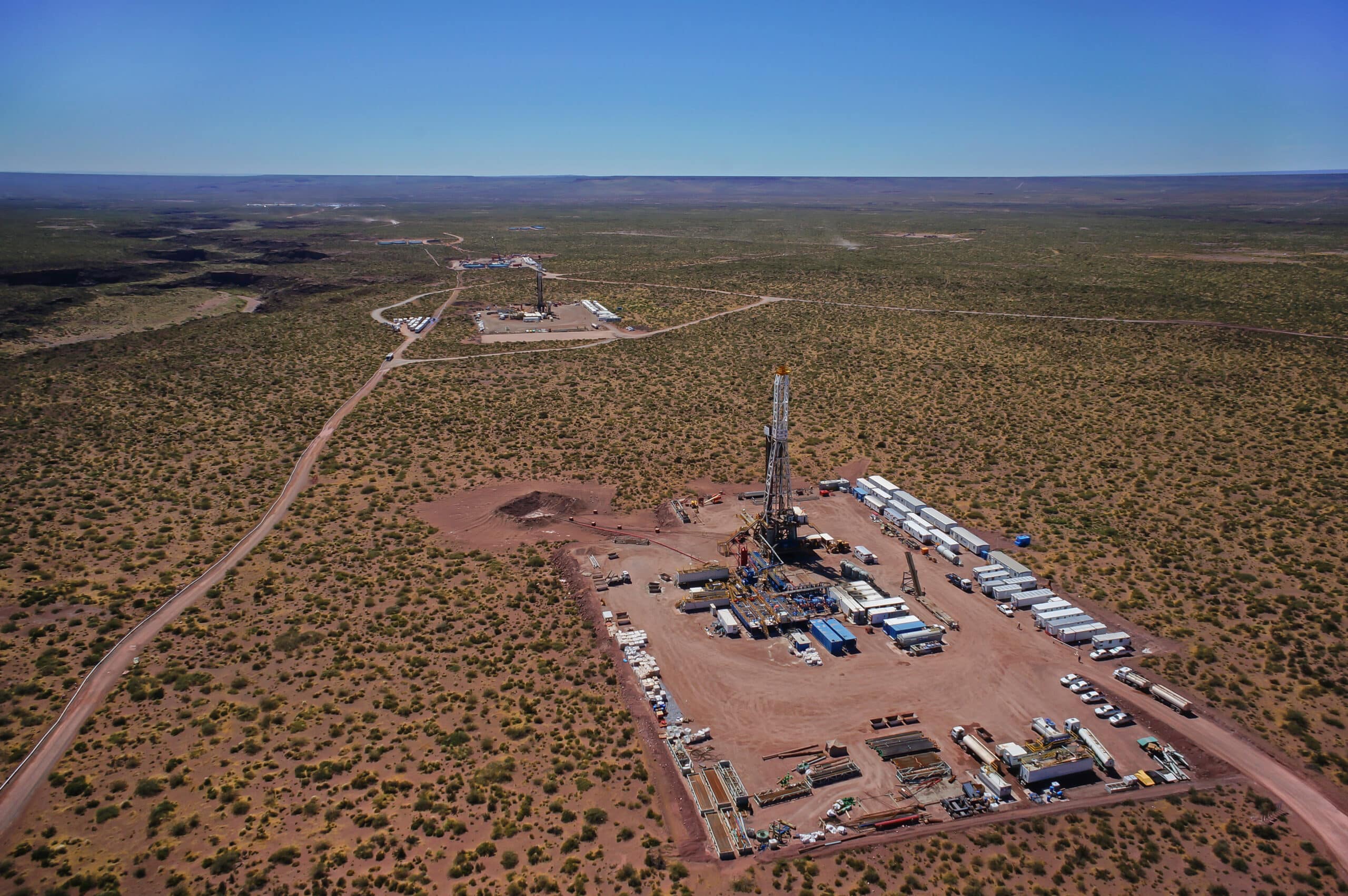 Vaca Muerta, Argentina, December 2, 2014: Extraction of unconventional oil. Battery of pumping trucks for hydraulic fracturing (Fracking).